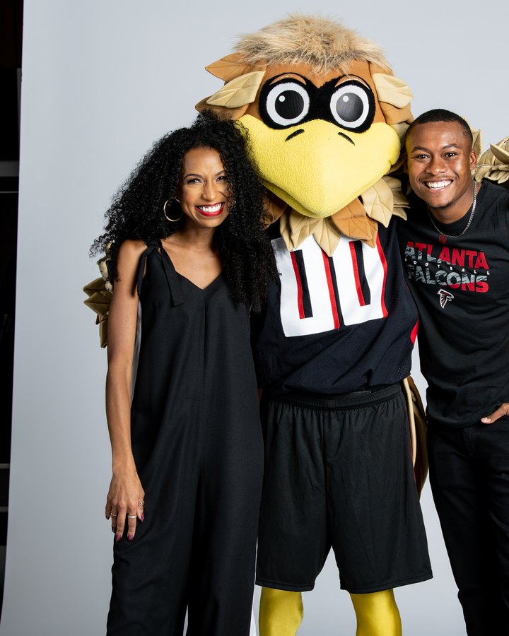 Chelsea with the Falcons mascot at the Falcons Insider photo shoot